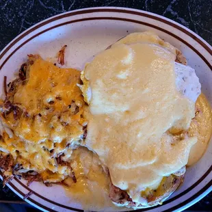 Eggs Benedict with cheesy hash browns