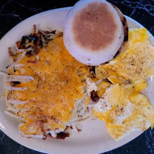 Scrambled eggs, cheesy hash browns, &amp; English muffin