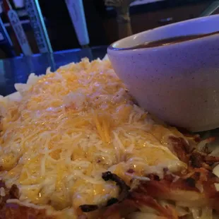 Cheesy hash browns and jus for the prime rib - usually the cheese is melted all the way.