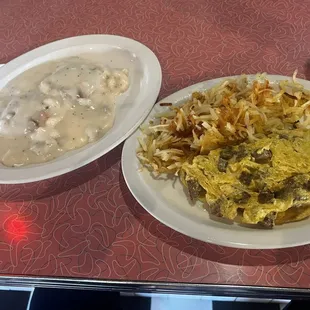 Sausage and cheddar omelette, hash-browns, biscuits and gravy.