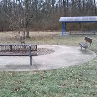 single shelter with some benches &amp; picnic tables, but no grill