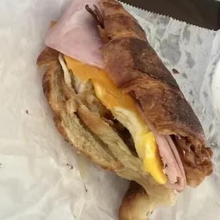 Meat lover Two eggs, extra bacon, extra ham, cheddar cheese on croissant!