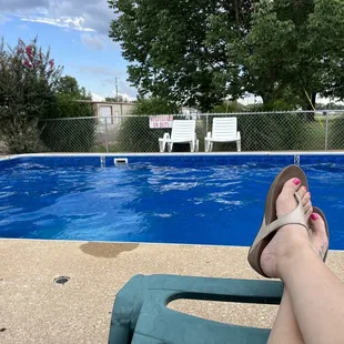 Relaxing beside the pool after a wonderful swim.