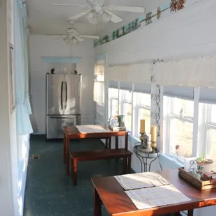 Inclosed porch for dining and refridgerator for your use.