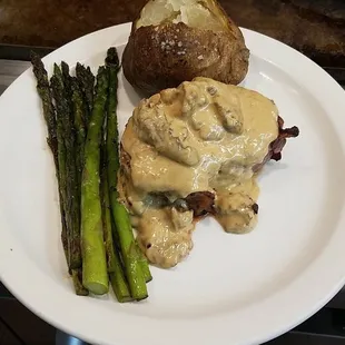 Filet With morel mushroom sauce and morel mushrooms and fresh asparagus.  Special time only this weekend.