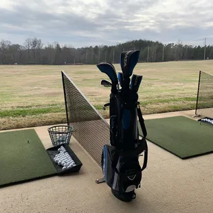 Covered driving range with heater options.