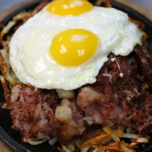 Corned Beef &amp; Hash. Skillet 2 eggs with hashbrowns and your choice of toast