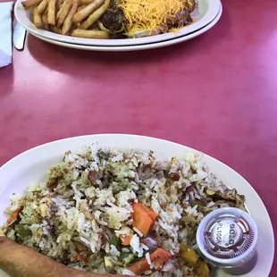 Steve had the Eagle dog &amp; I had the fried rice &amp; lumpia with hot banana sauce. Yum!