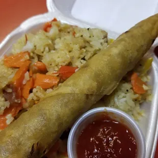 FRIED rice and Lumpia with a sweet dipping sauce!! Huge portion and my absolute favorite!!