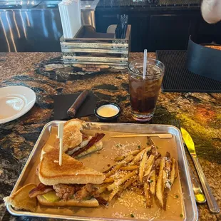 Food, drinks and cigar.