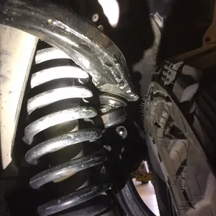 This is the kind of "quality," work they do. Do they really think it is supposed to be touching the spring like that?