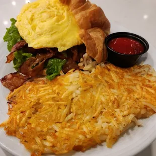 BLTA on a croissant overflowing with ingredients!! Nice!!