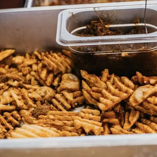 Waffle fries, fresh from the fryer
