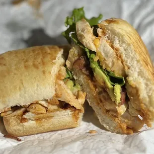 a chicken sandwich cut in half