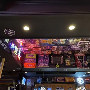 a bar with neon signs