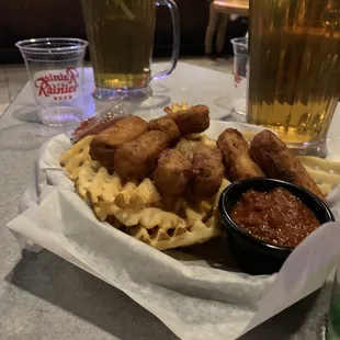 Mozzarella sticks, waffle fries, and a couple of $5 pitchers of Bud