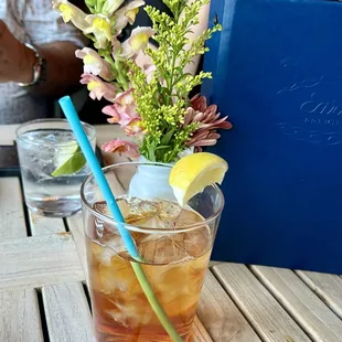 My iced tea and cute flowers.