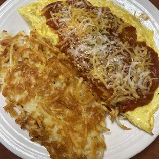 Spanish Omelet with bell peppers, onions, cheese and red sauce.