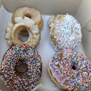 a variety of donuts in a box