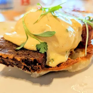 a close up of a sandwich with cheese