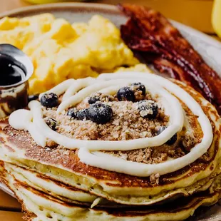 a plate of pancakes and eggs