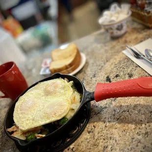 an omelet in a cast iron skillet