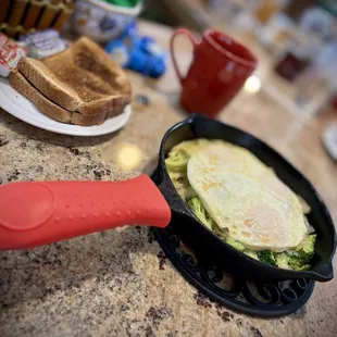 an omelet in a cast iron skillet