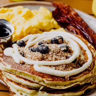 a plate of pancakes and eggs