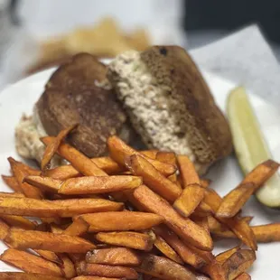 a plate of fries and a sandwich