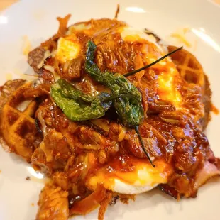La Jeffa: Johnny cake waffle, BBQ pork, white cheddar, shoulder bacon, and two eggs over medium. Shishito peppers on top. So good!!