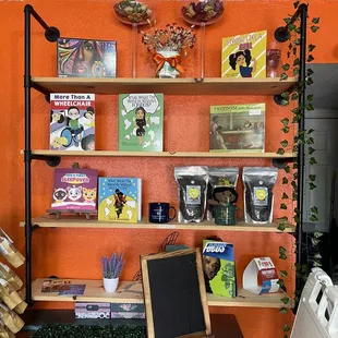 a kitchen with orange walls