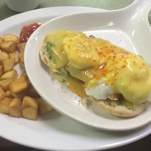 Eggs Benedict with breakfast potatoes