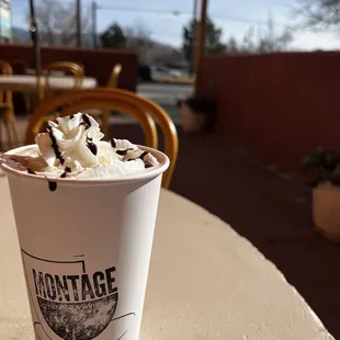 a cup of hot chocolate and whipped cream