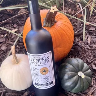 pumpkins and a bottle of rum