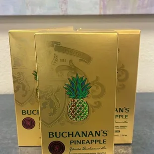 two boxes of buchanana's pineapple