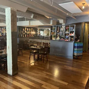 a view of the bar and dining area