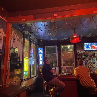 people sitting at the bar