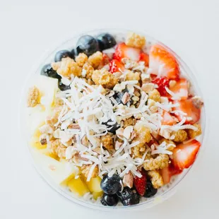 a bowl of fruit and granola