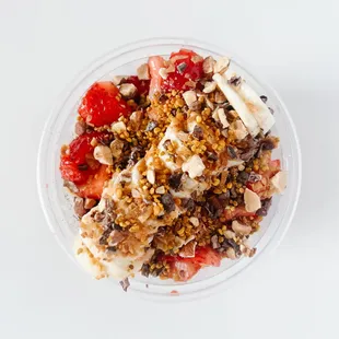 an overhead view of a bowl of food