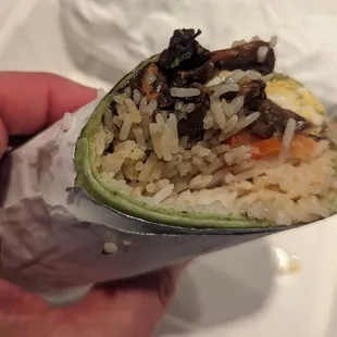 Excellent breakfast wrap ($13) with eggs, rice, mushrooms, cheese, and other goodies. Very big and really good.