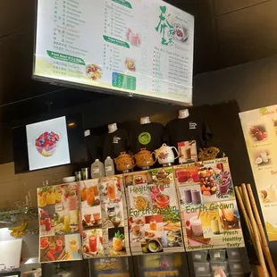 Menu overhead with pics of drinks under.