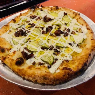 Dill pickle bacon ranch pizza.