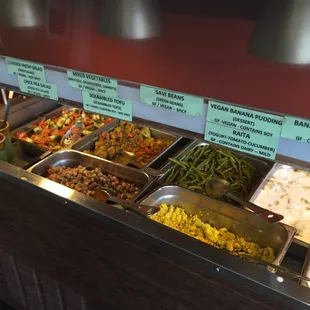 a variety of food items in a buffet