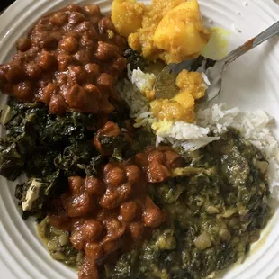 All vegan, organic and DELICIOUS! Spinach and tofu, masala, lentils &amp; spinach (sag daal) and potatoes!