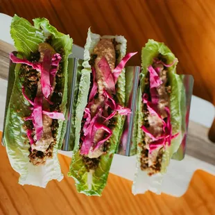 Rawvolutionary Tacos: Lettuce wraps, housemade sunflower seeds and hemp seeds meat, cashew queso cream, pickled cabbage.

#rawvegan
