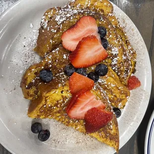 French Toast topped with Strawberries and Blueberries