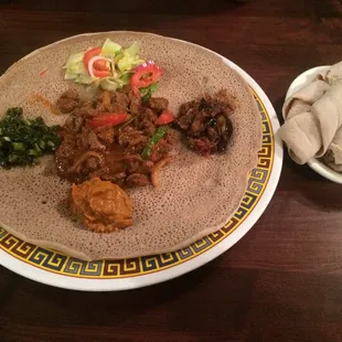 Tibsi combo w/ vegetables The flavor was amazing. This dish you eat with your hands. Meant for sharing. chat: POWERFULAPACHE