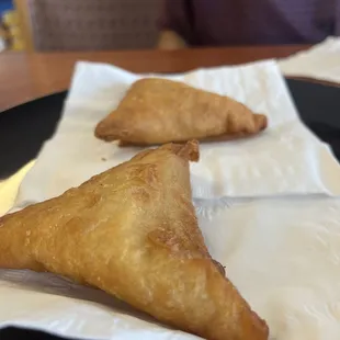 three pastries on a plate