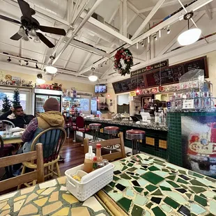 Inside the restaurant, cashier side.