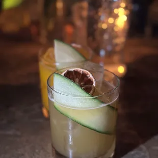 two cocktails on a table